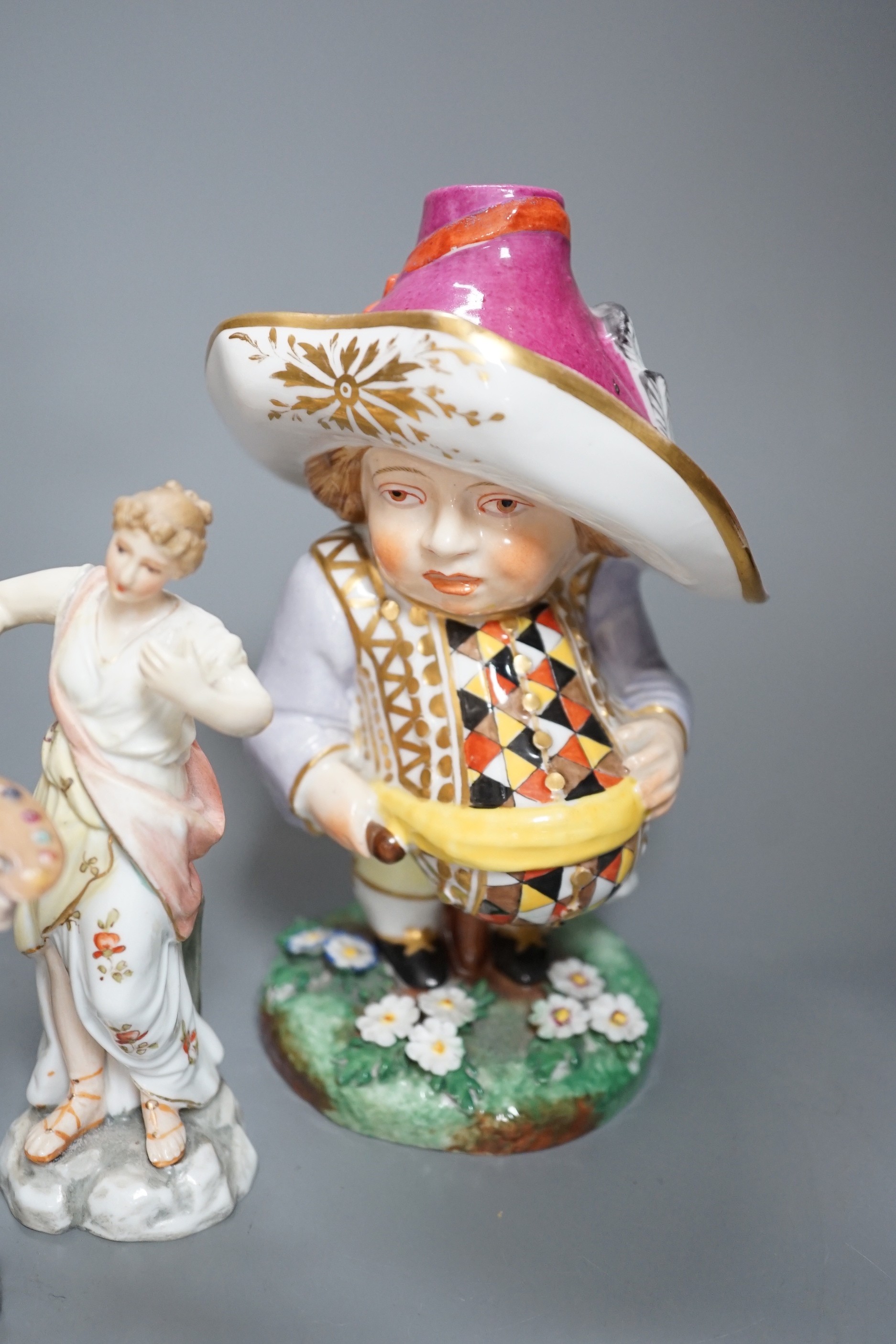 A selection of mainly Continental porcelain figures including Royal Crown Derby style mansion house dwarf